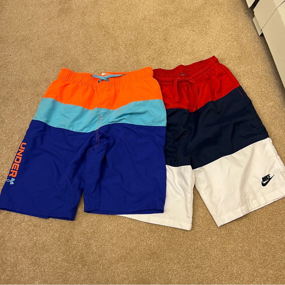 2 pair Youth XL swim shorts bottoms. Under armour and nike. Like new condition